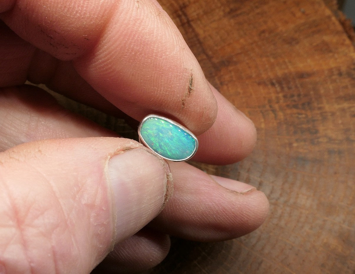 Silver tie tack with a Coober Pedy opal