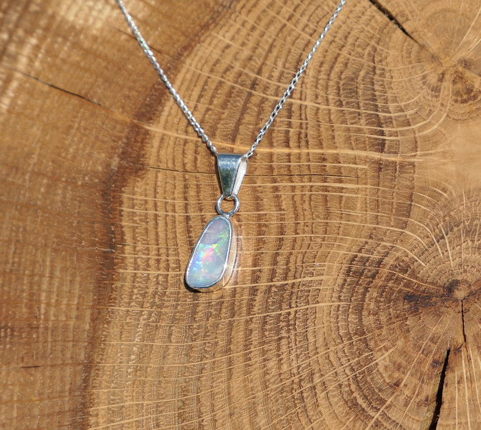 Silver opal pendant with a Mintabie solid opal