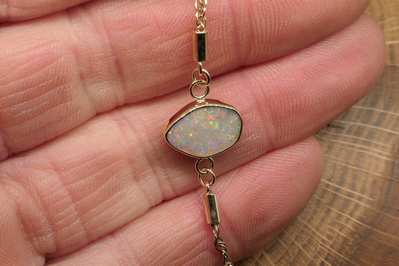 9k gold opal bracelet with a Lightning Ridge semi-black opal