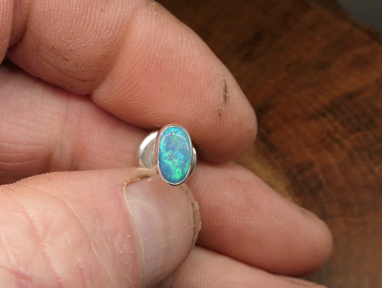 Silver tie tack with a Coober Pedy opal