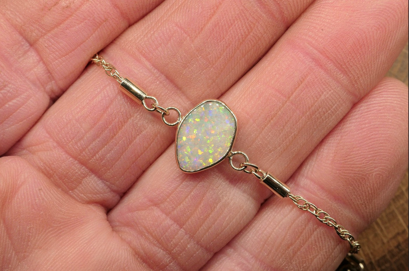 9k gold opal bracelet with a Lightning Ridge semi-black opal