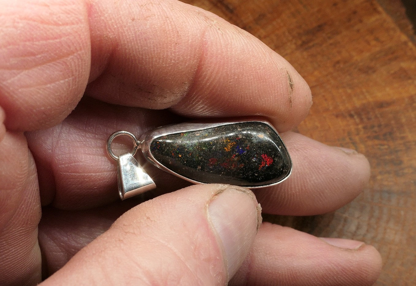 Silver opal pendant with a Honduran matrix opal