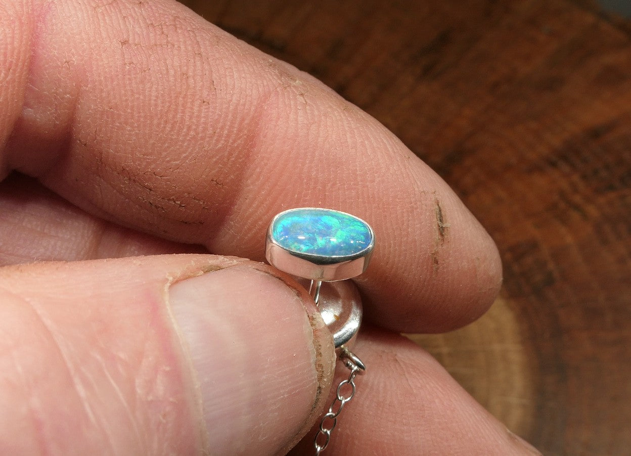Silver tie tack with a Coober Pedy opal