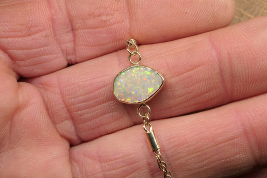 9k gold opal bracelet with a Lightning Ridge semi-black opal