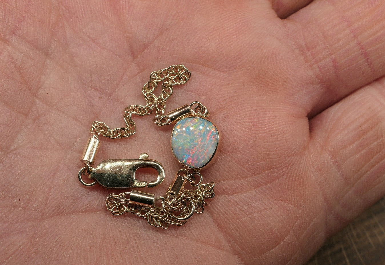 9k gold opal bracelet with a Mintubi solid opal.
