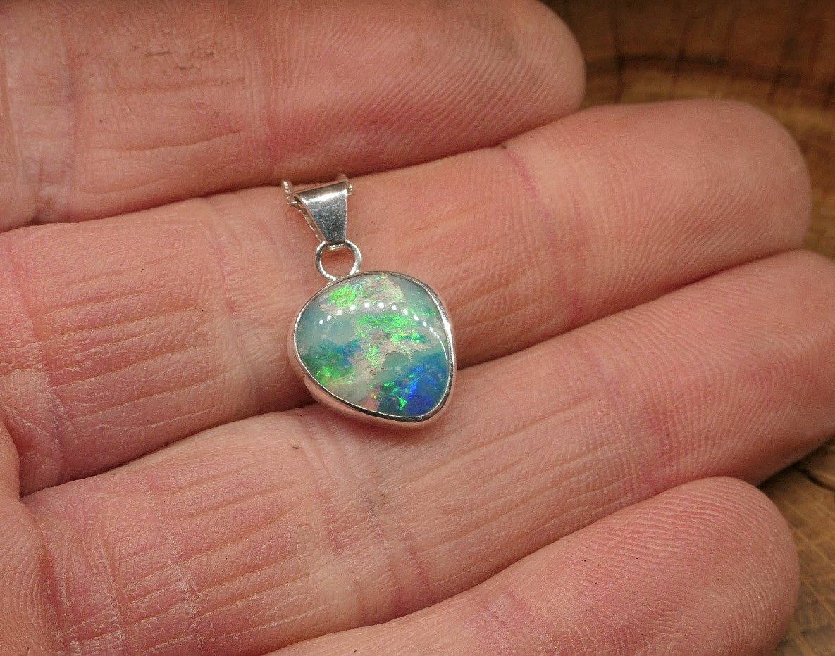 Opalised shell pendant