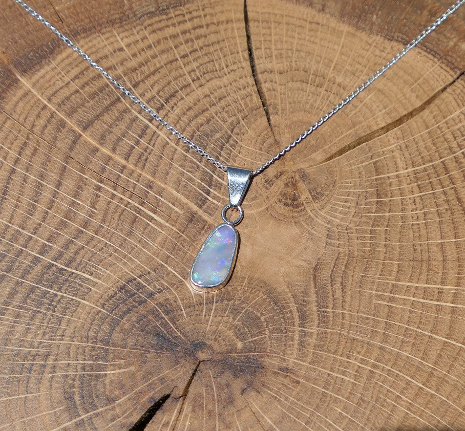 Silver opal pendant with a Mintabie solid opal