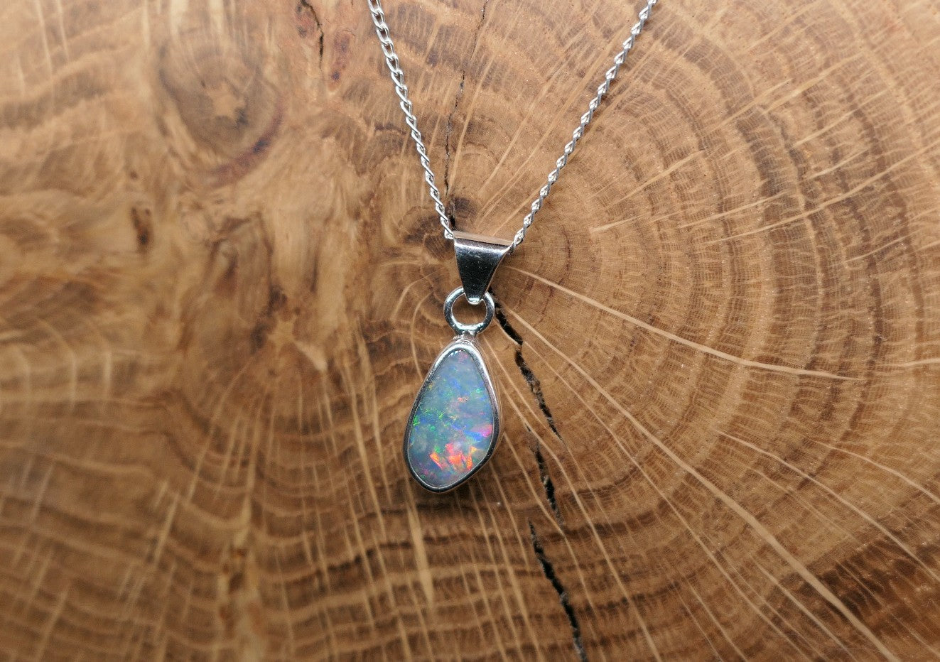 Opalised shell pendant