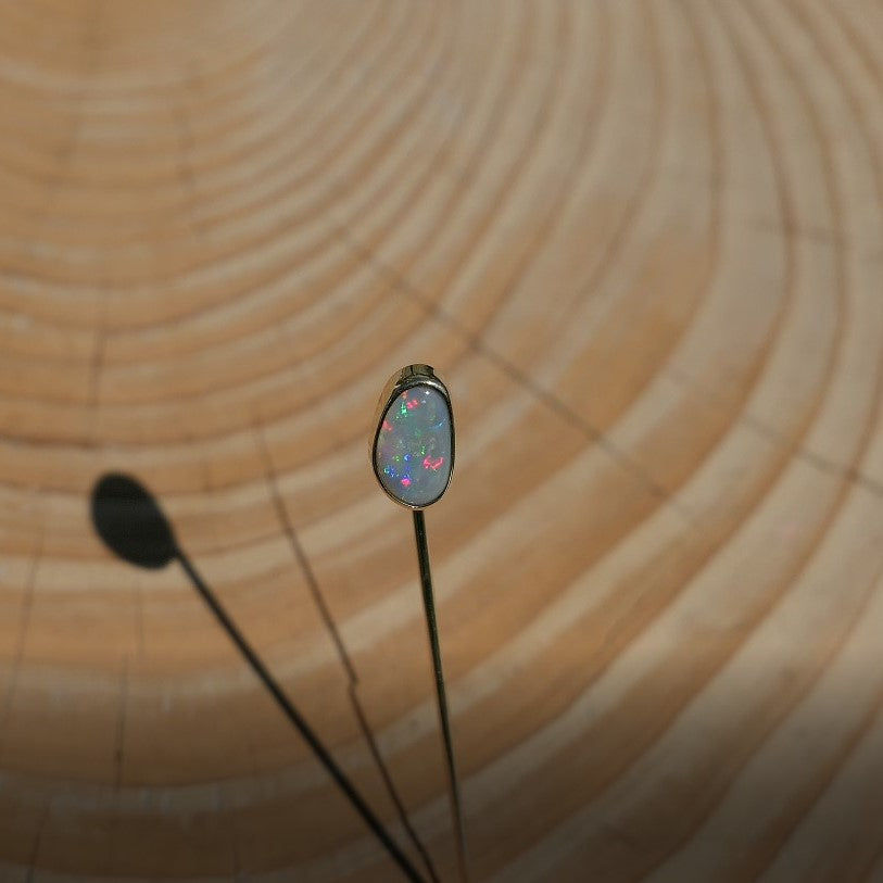 Lightning Ridge opal tie pin, opal is 0.75ct, measures 9x5mm, semi black n6 body tone, 4/5 brightness.