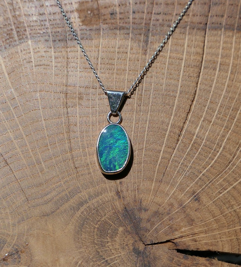 Silver opal pendant with a Coober Pedy doublet.