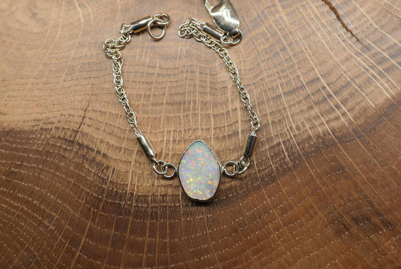 9k gold opal bracelet with a Lightning Ridge semi-black opal