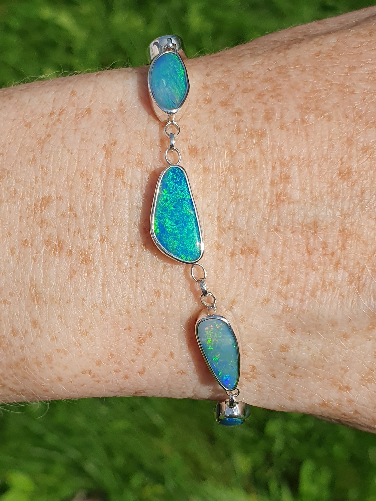 Silver opal bracelet, beautiful bright greens and blue opals