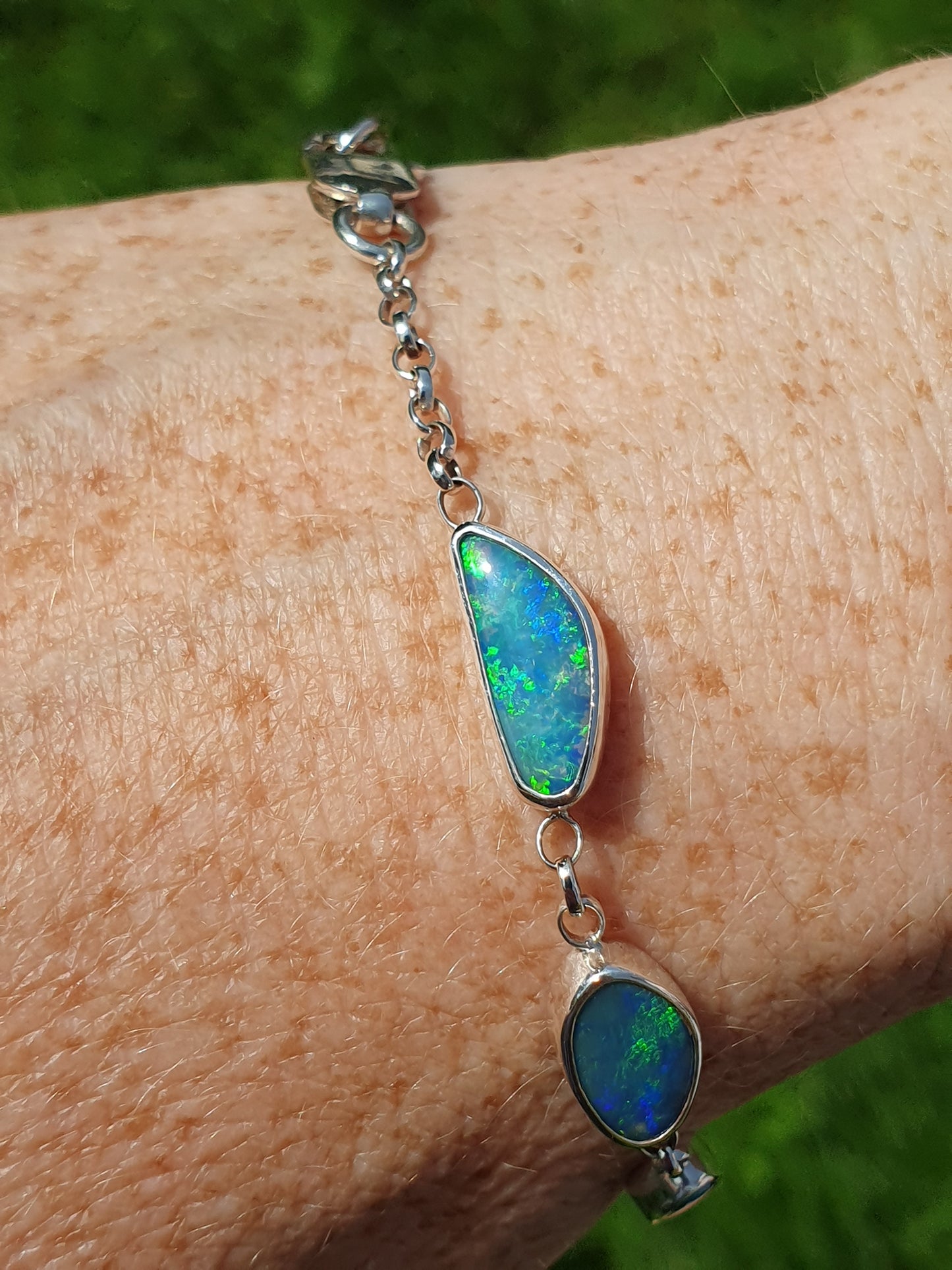 Silver opal bracelet, beautiful bright greens and blue opals