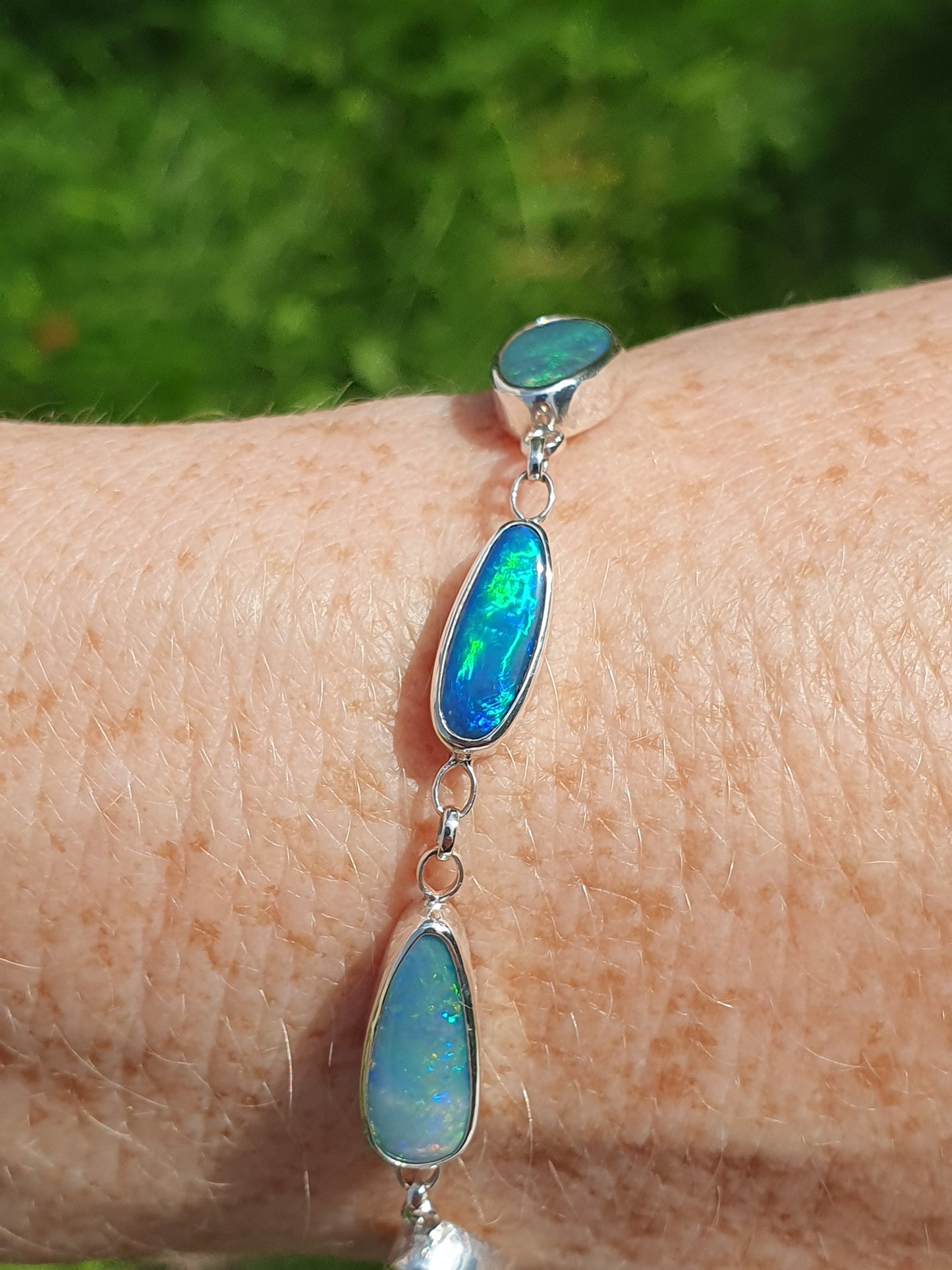 Silver opal bracelet, beautiful bright greens and blue opals