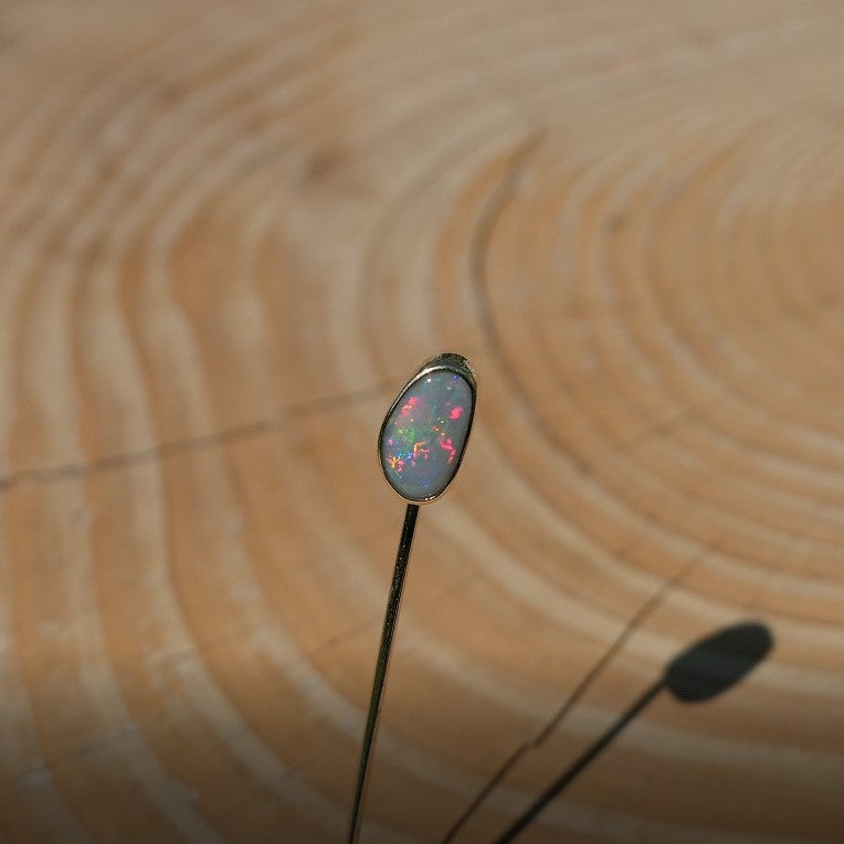 Lightning Ridge opal tie pin, opal is 0.75ct, measures 9x5mm, semi black n6 body tone, 4/5 brightness.