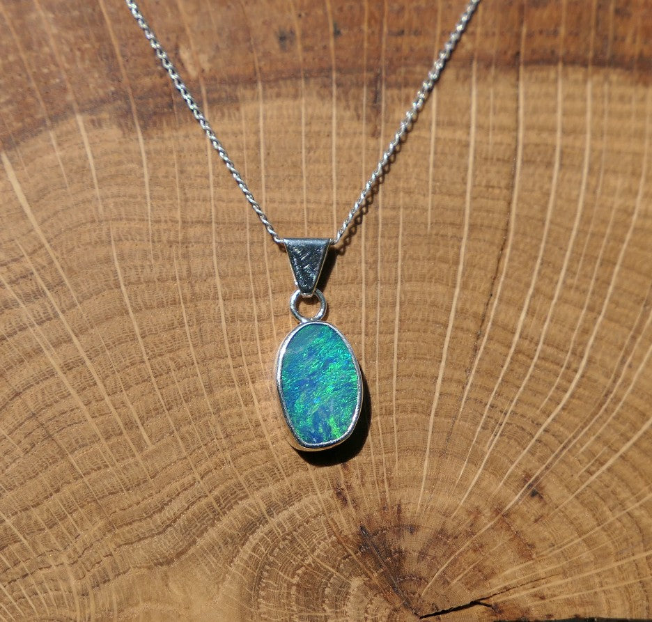 Silver opal pendant with a Coober Pedy doublet.
