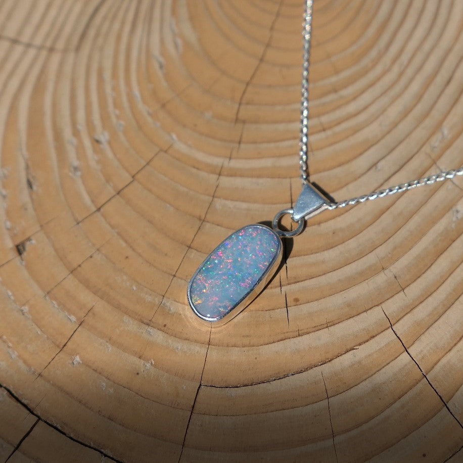 Silver opal pendant with a Coober Pedy doublet.