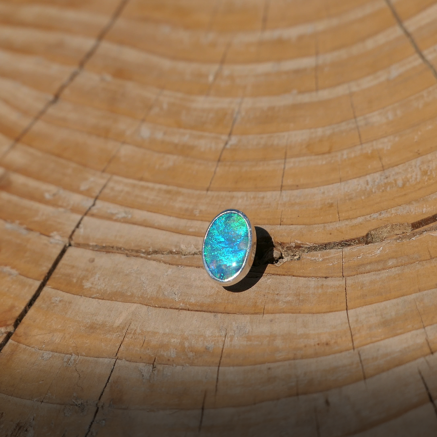 Silver tie tack with Coober Pedy opal.