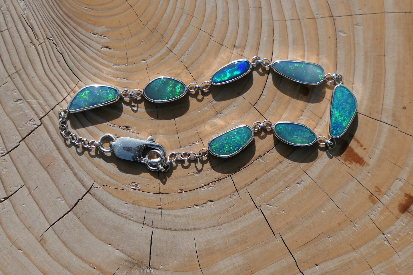 Silver opal bracelet, beautiful bright greens and blue opals