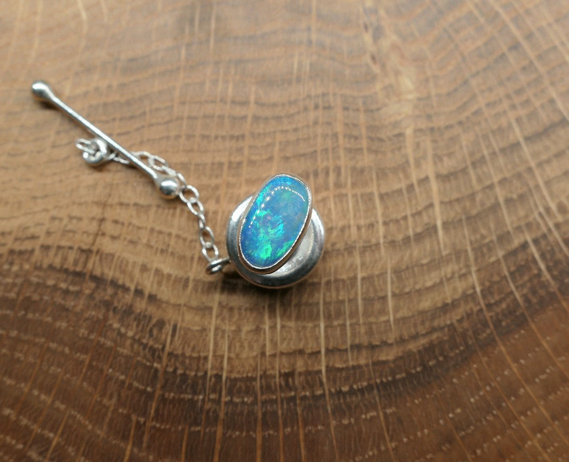 Silver tie tack with a Coober Pedy opal
