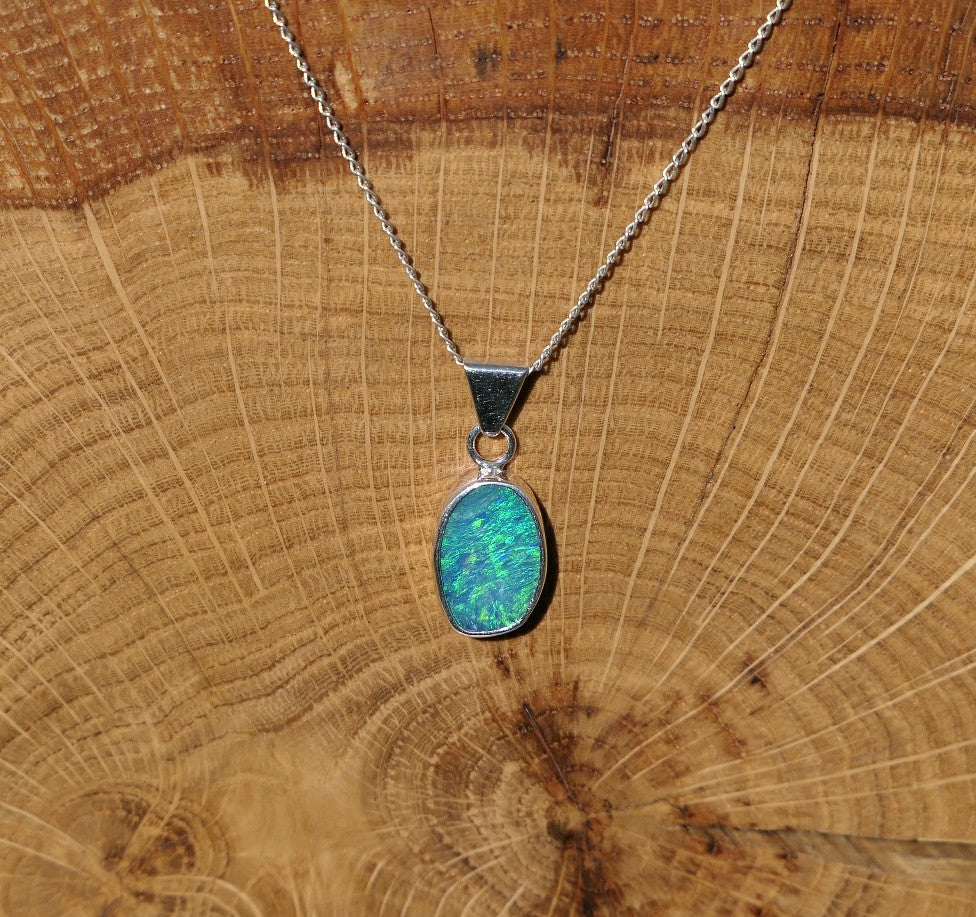 Silver opal pendant with a Coober Pedy doublet.