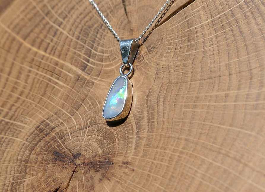 Silver opal pendant with a Mintabie solid opal