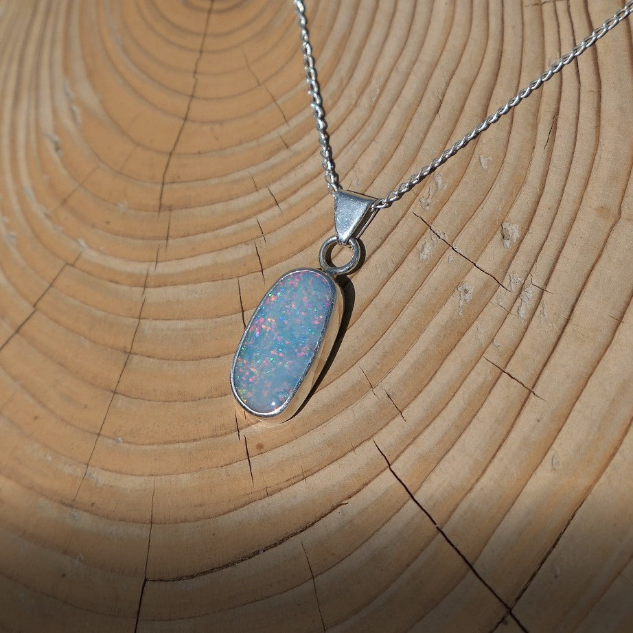 Silver opal pendant with a Coober Pedy doublet.