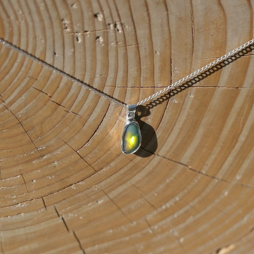 Silver pendant with a Coober Pedy doublet.