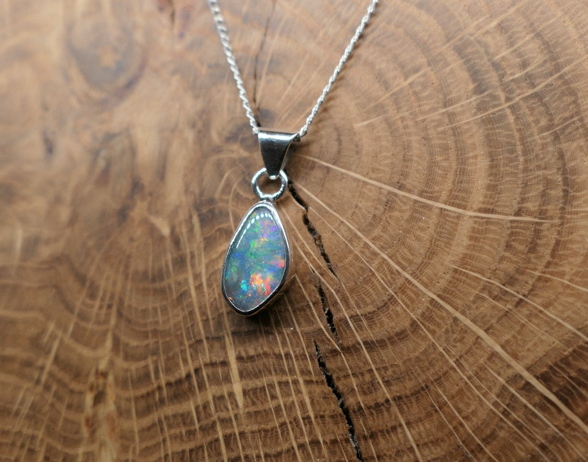 Opalised shell pendant