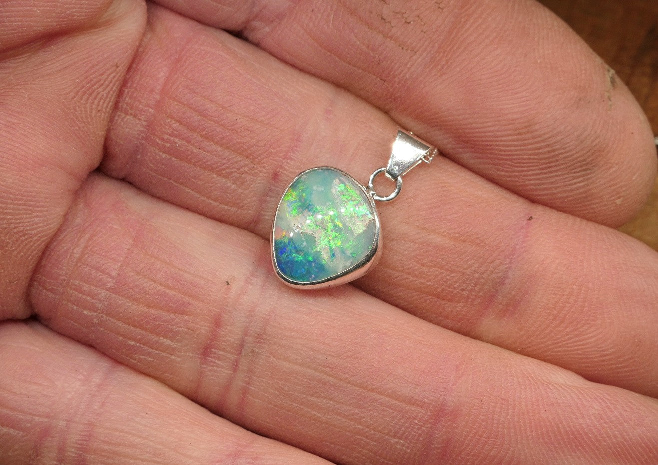 Opalised shell pendant
