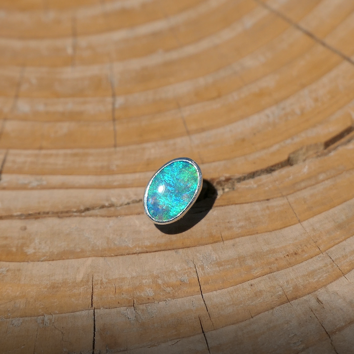 Silver tie tack with Coober Pedy opal.