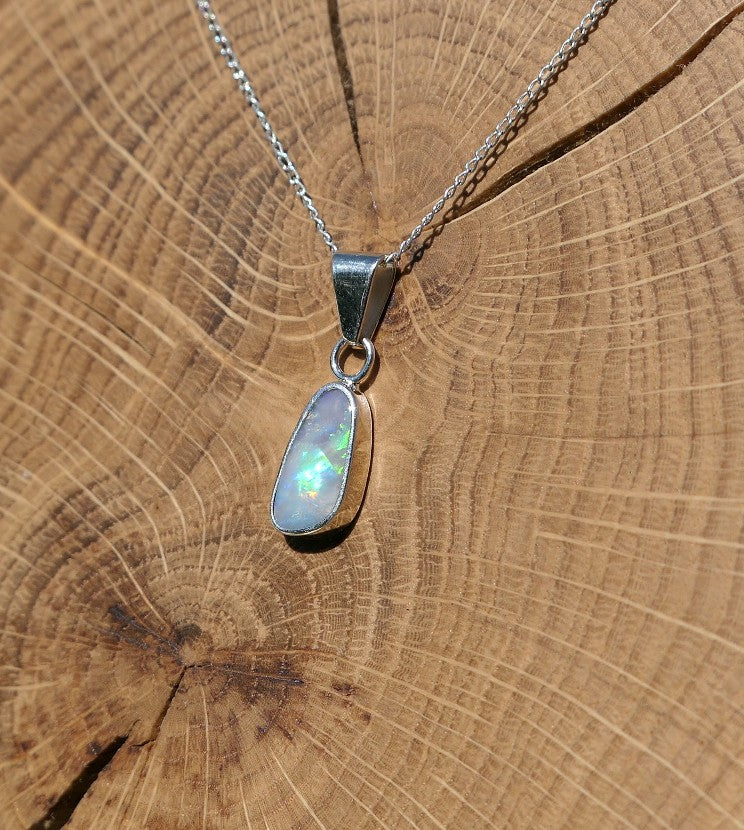 Silver opal pendant with a Mintabie solid opal