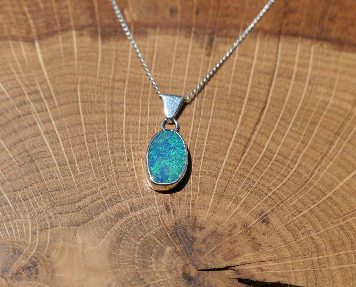 Silver opal pendant with a Coober Pedy doublet.