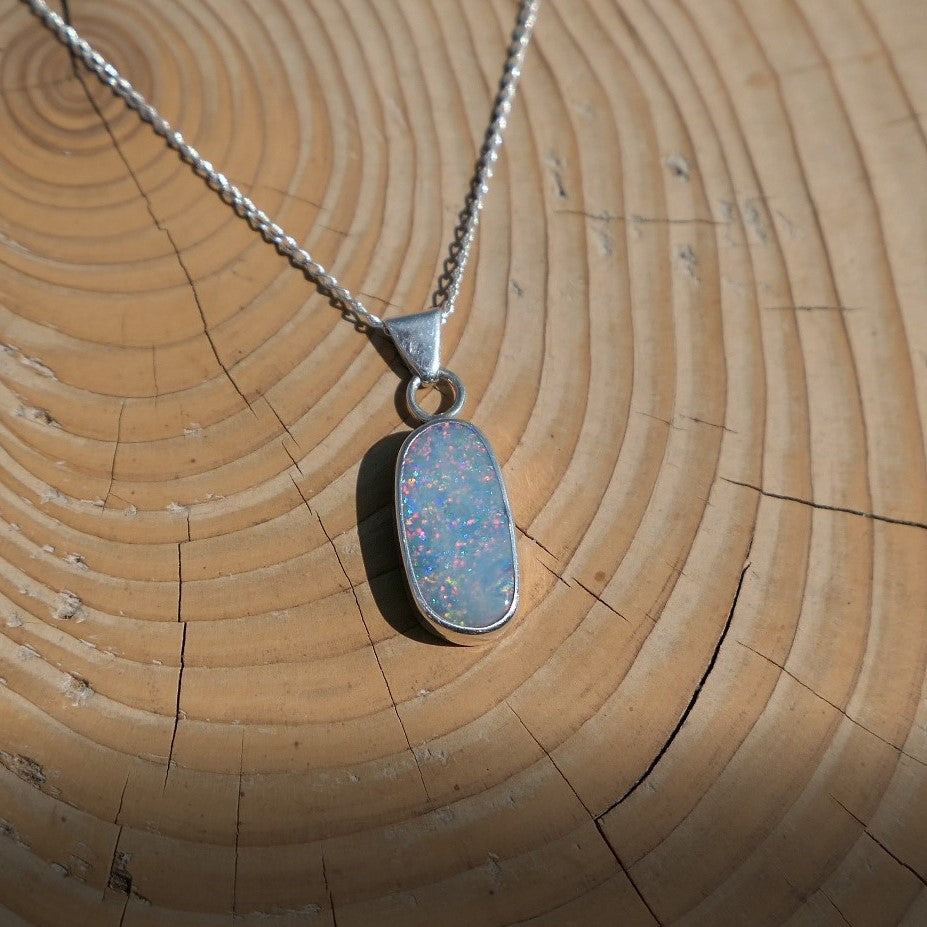 Silver opal pendant with a Coober Pedy doublet.