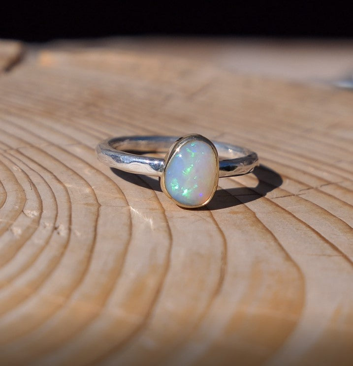 Lightning Ridge crystal opal ring with 18k gold bezel