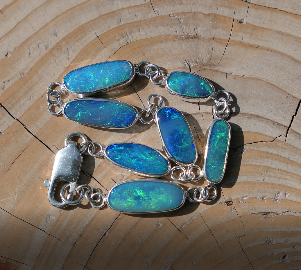 Silver opal bracelet, beautiful bright greens and blue opals