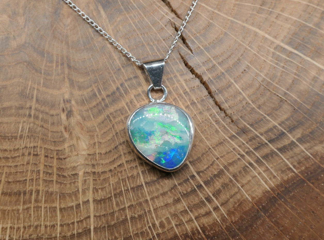 Opalised shell pendant