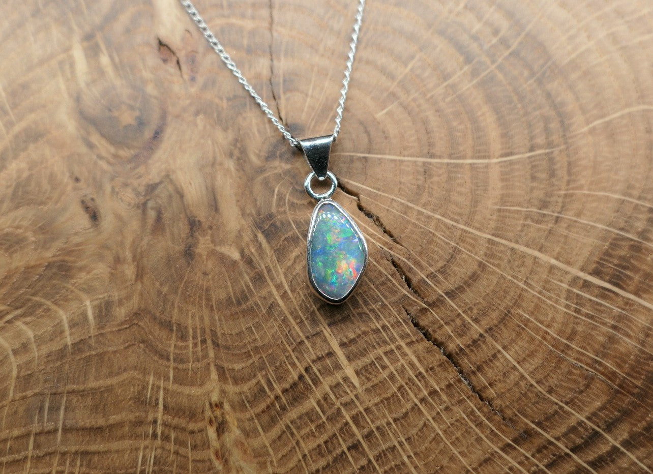 Opalised shell pendant