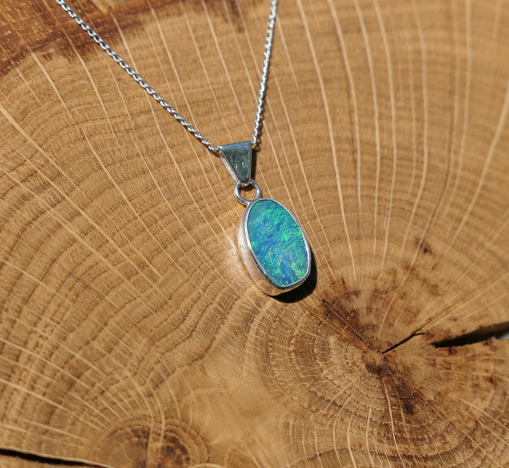 Silver opal pendant with a Coober Pedy doublet.