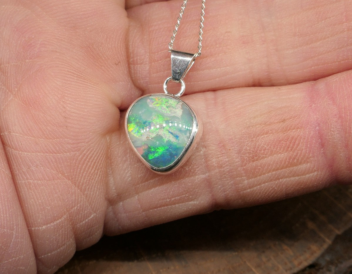 Opalised shell pendant