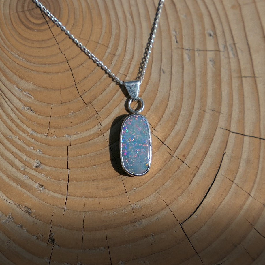 Silver opal pendant with a Coober Pedy doublet.