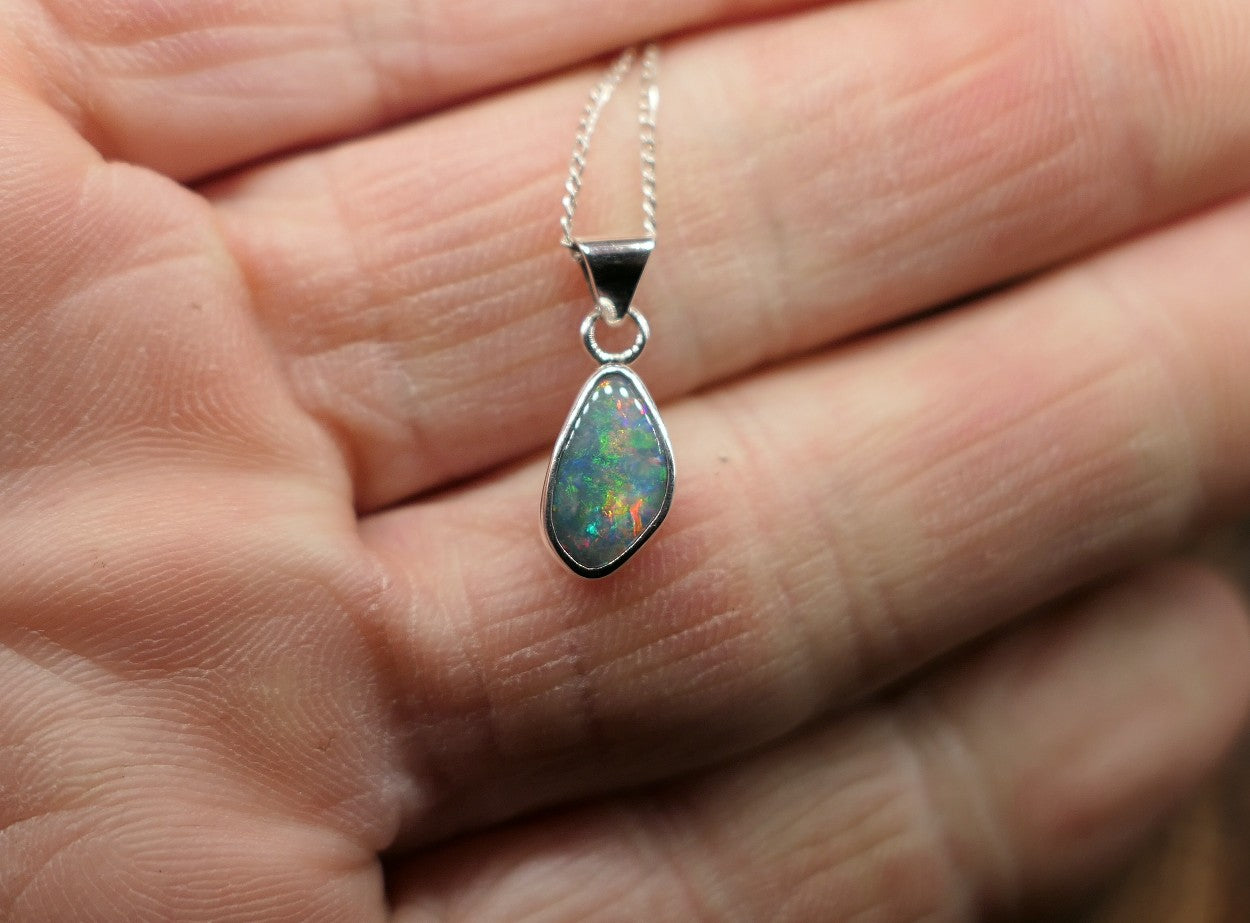 Opalised shell pendant
