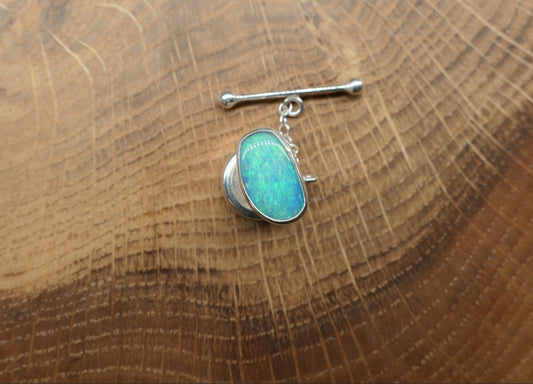 Silver tie tack with a Coober Pedy opal