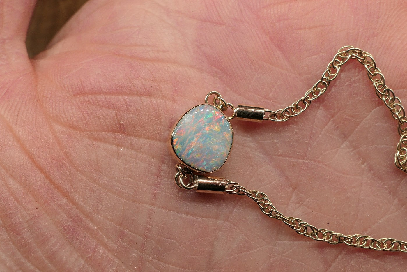 9k gold opal bracelet with a Mintubi solid opal.
