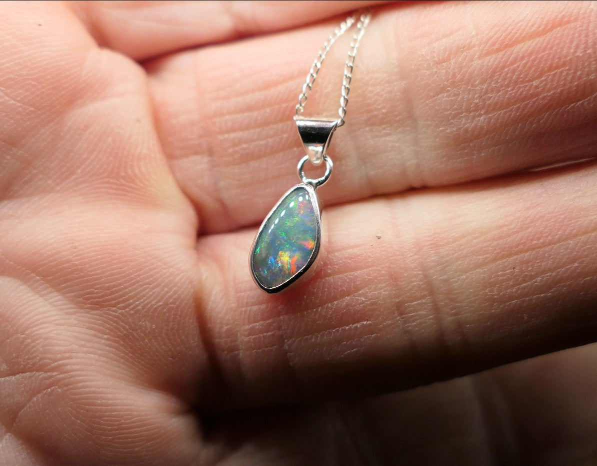 Opalised shell pendant
