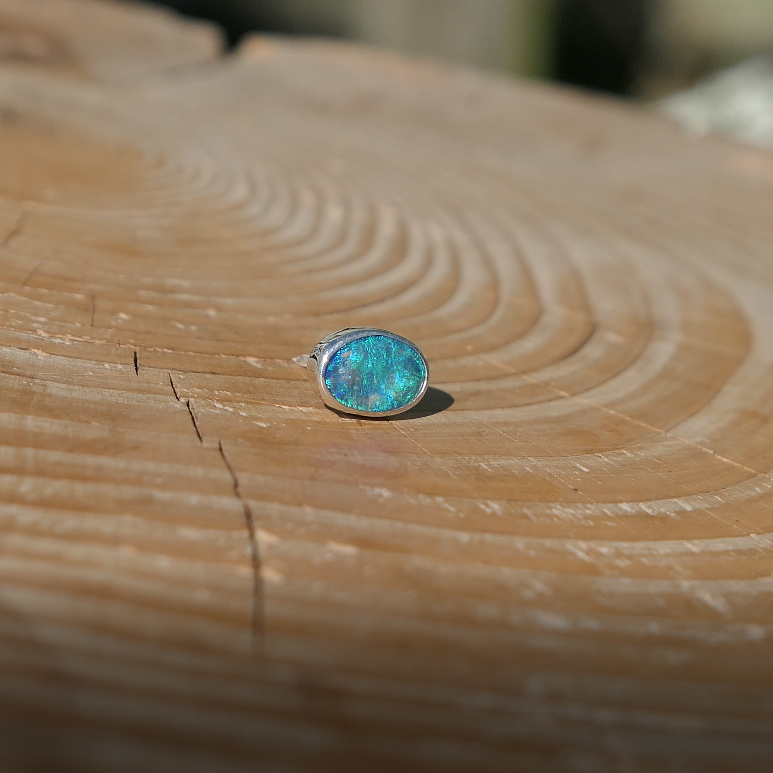 Silver tie tack with Coober Pedy opal.