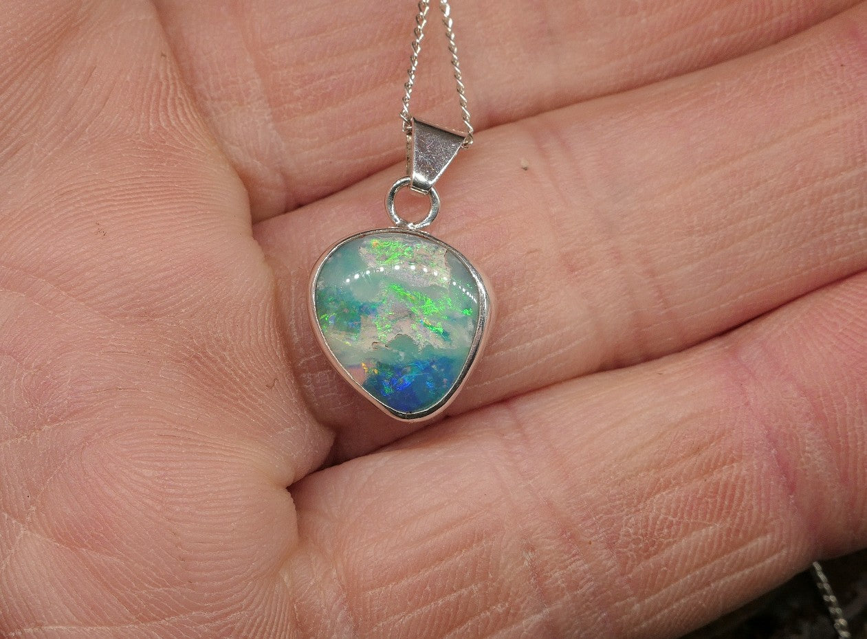 Opalised shell pendant
