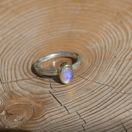 Silver opal ring with 18k gold bezel