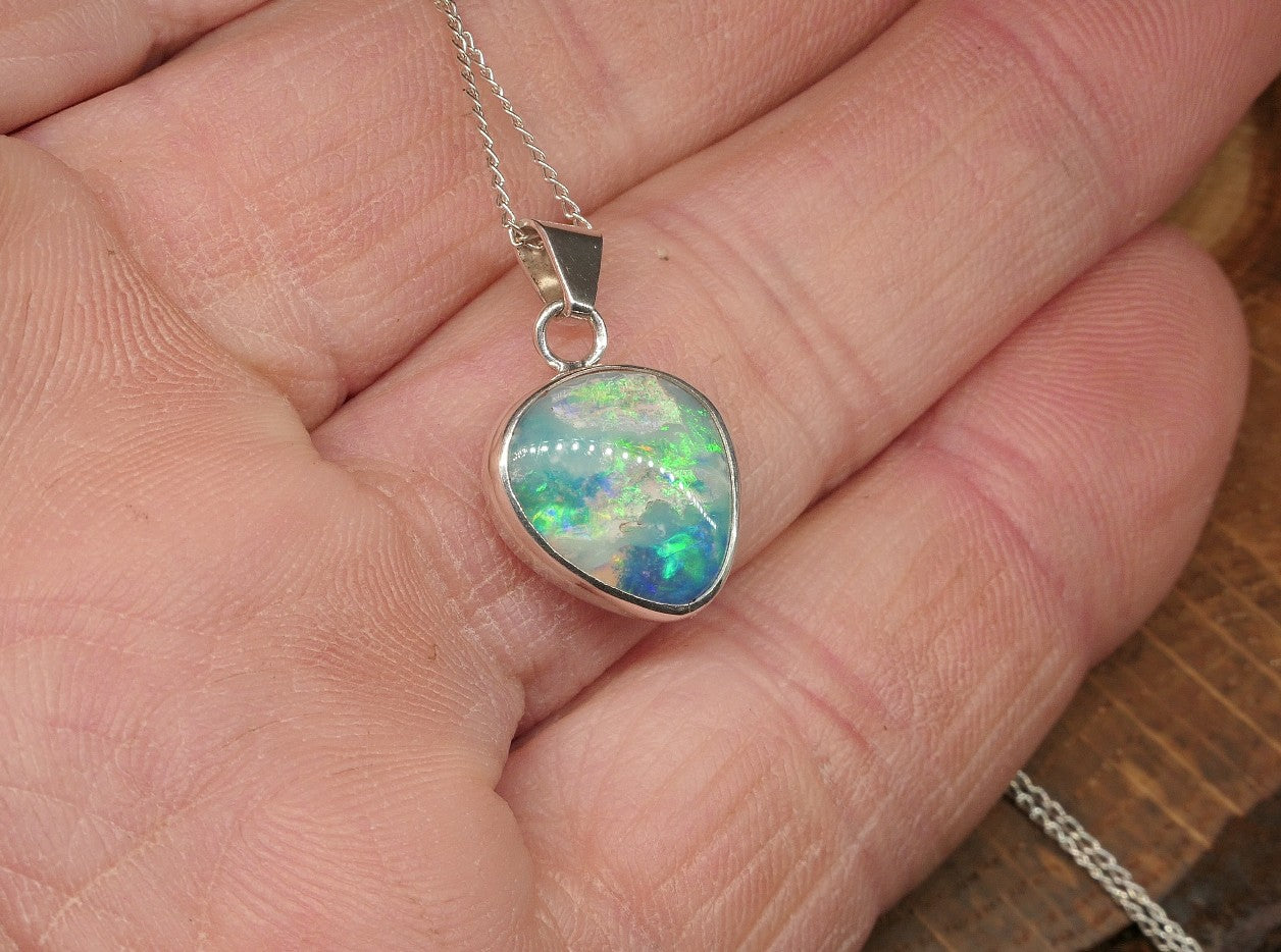 Opalised shell pendant