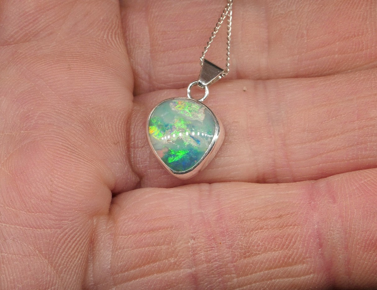 Opalised shell pendant
